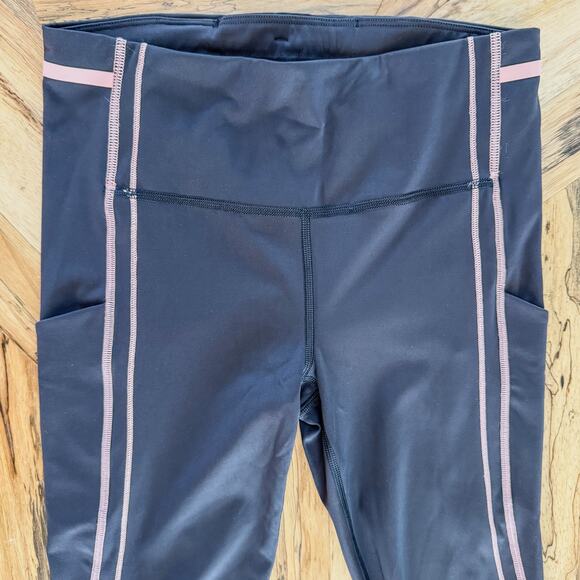 Athleta Ultimate Stash Pocket Ignite 7/8 Tight Legging, Black & Pink, Medium - Picture 6 of 10